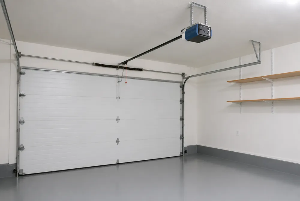 Chain drive garage door opener mounted to the ceiling of a Denver metro garage